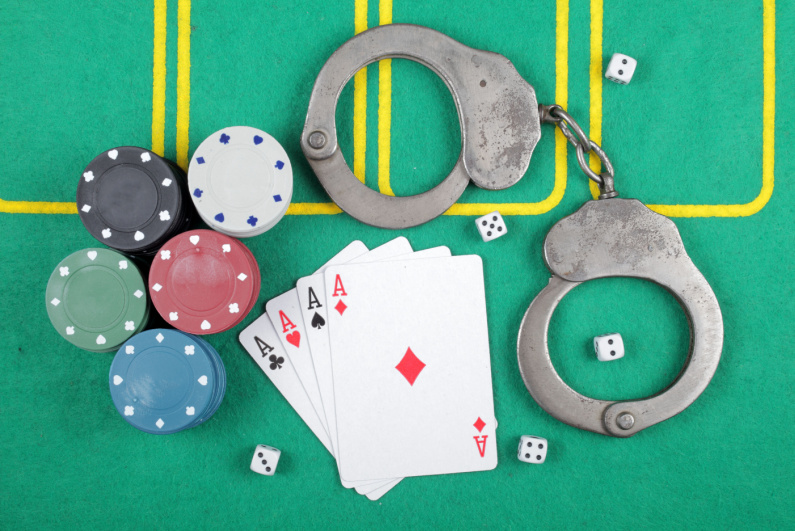 Handcuffs on poker table