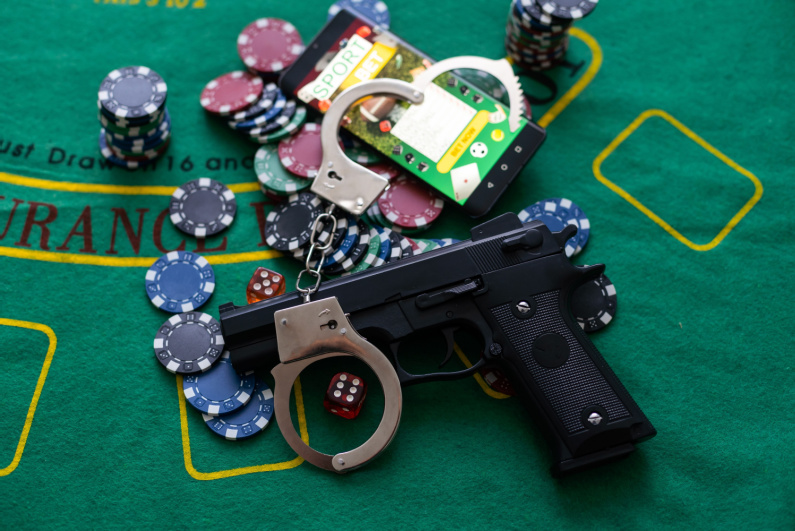 Gun with casino chips