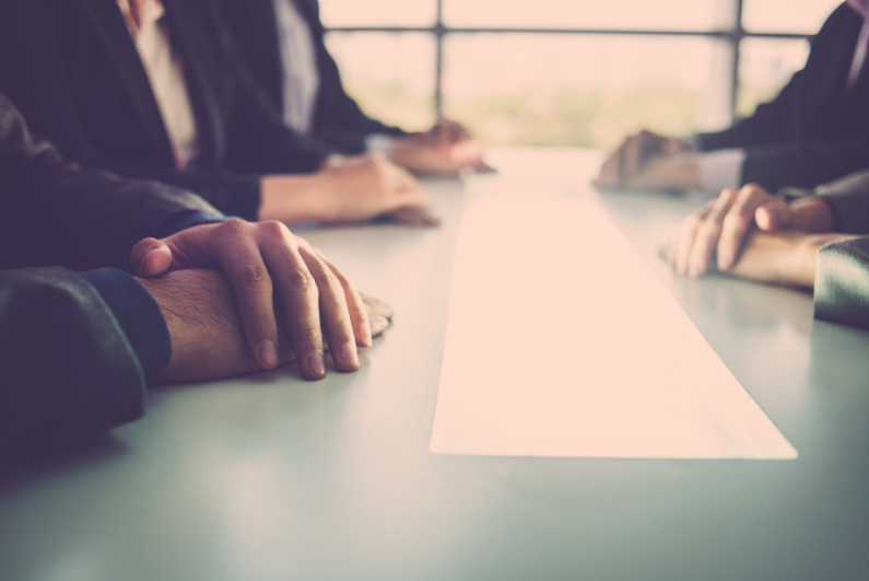 Businesspeople at conference table