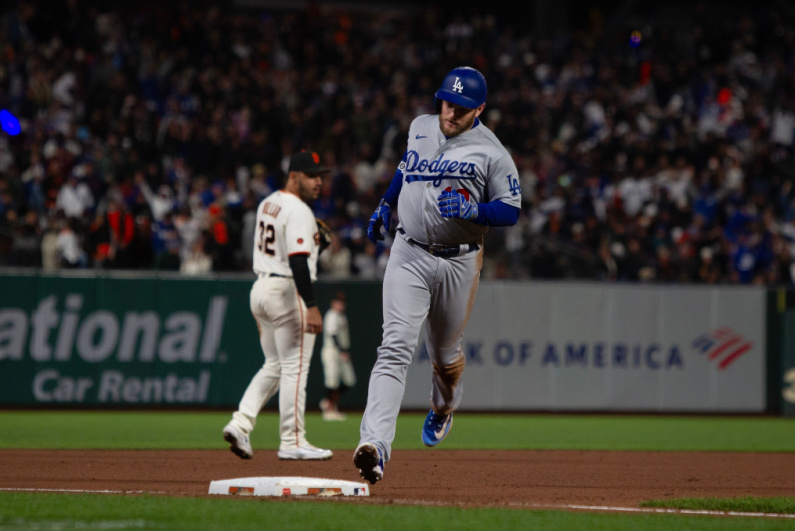 Max Muncy rounding third on a homerun