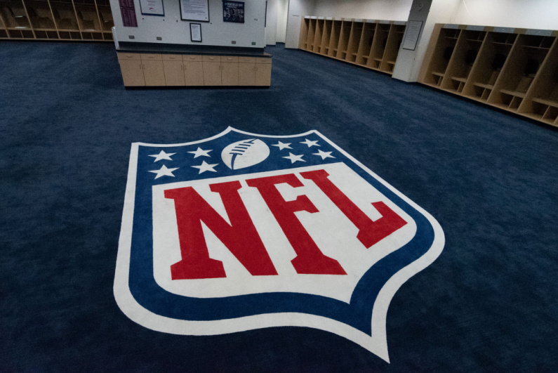NFL logo on locker room floor