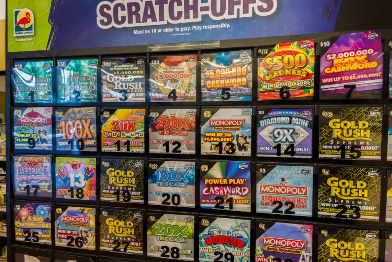 Scratch-off lottery ticket machine