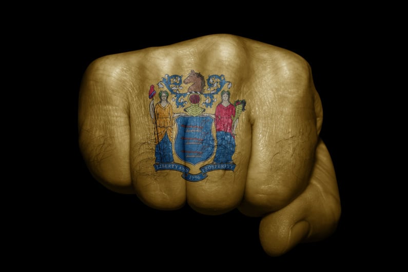 New Jersey flag on fist