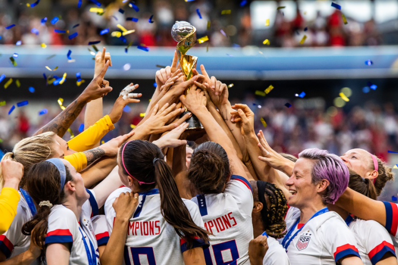 US team celebrating Women's World Cup victory