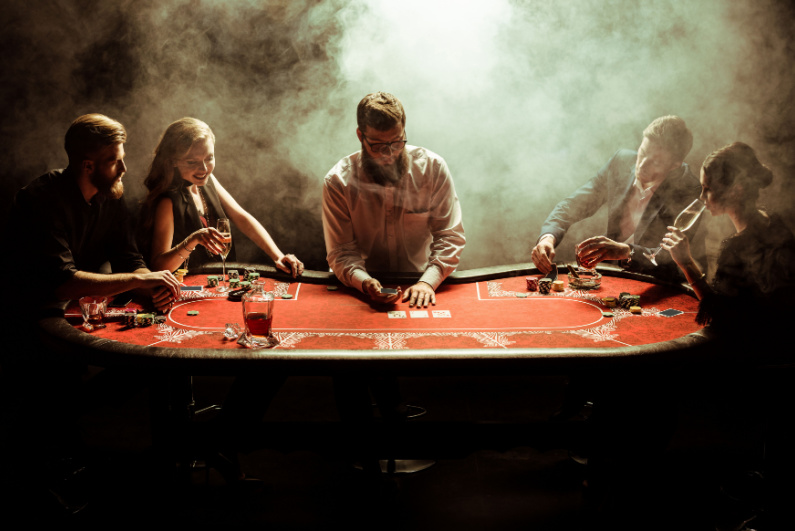 People playing poker in a smoky room