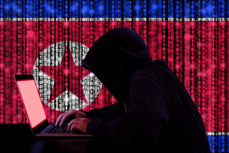 North Korean hacker with flag