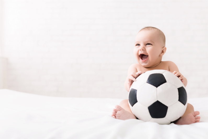 Baby with a soccer ball