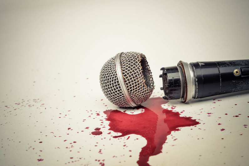 Broken microphone with blood