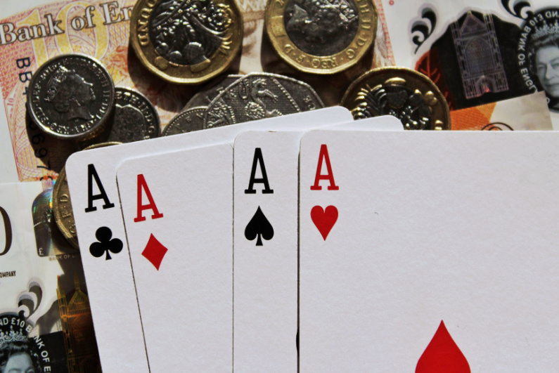 Four aces on British money