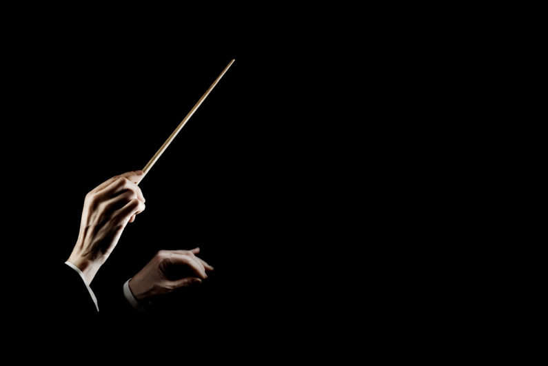 The conductor's hands with the baton