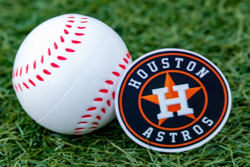 Baseball with Houston Astros badge