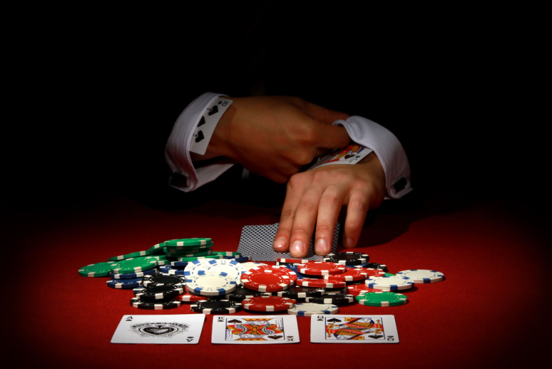 Poker player with cards up sleeves