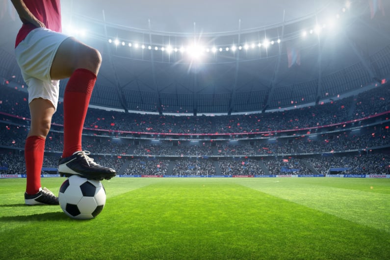 Football player standing on the field