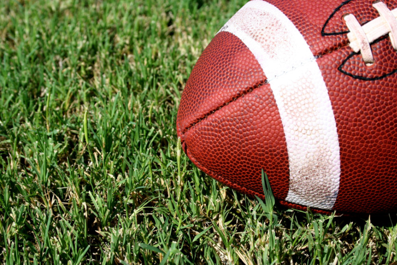 Closeup of a football on grass