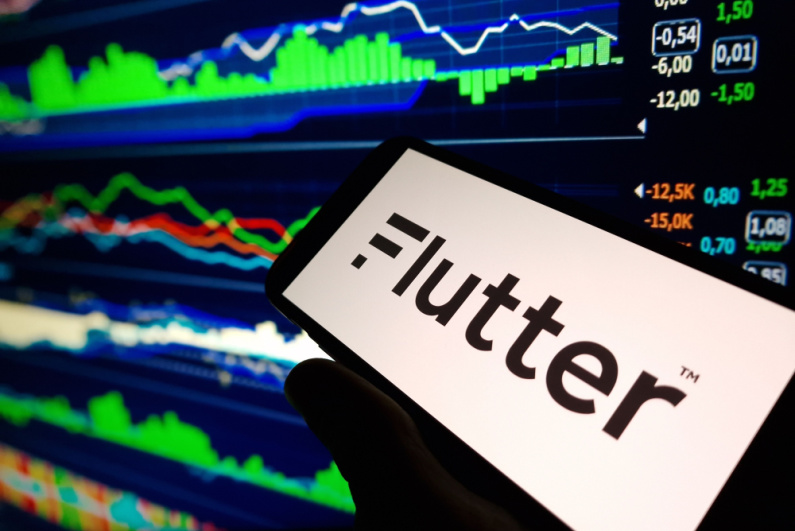 Flutter logo with shares behind