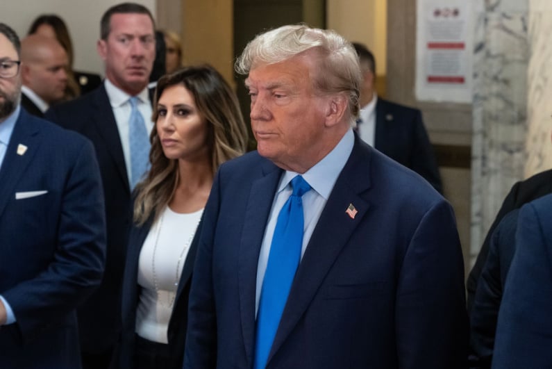 Donald Trump enters the courtroom in New York