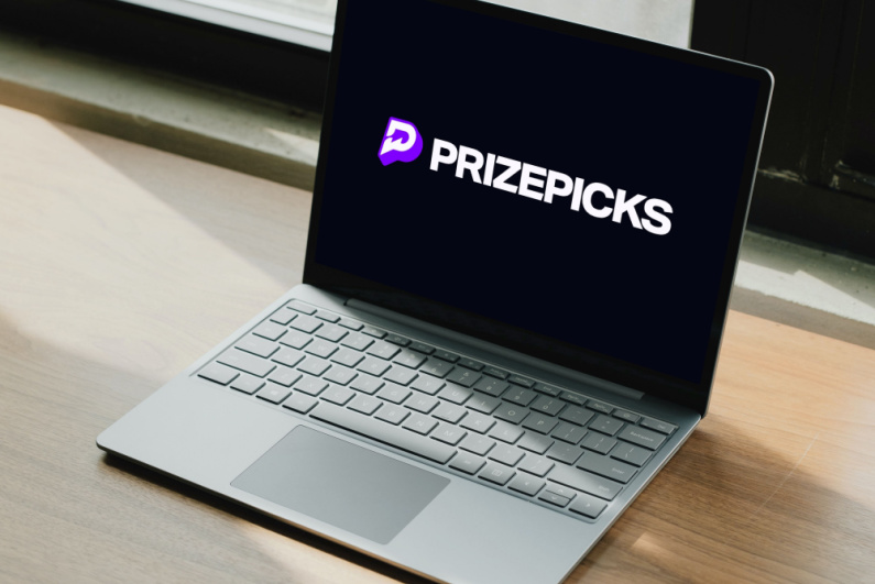 PrizePicks logo on laptop