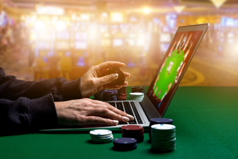 Person gambling on laptop