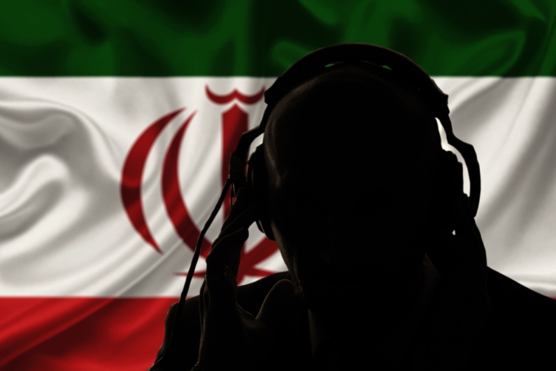 Iran flag with man wearing headphones