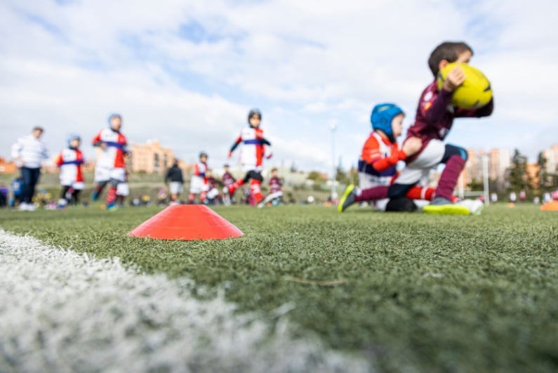 Kids playing rugby