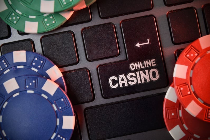 Laptop with ONLINE CASINO on Enter key