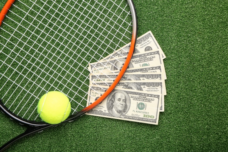 Tennis racket and money