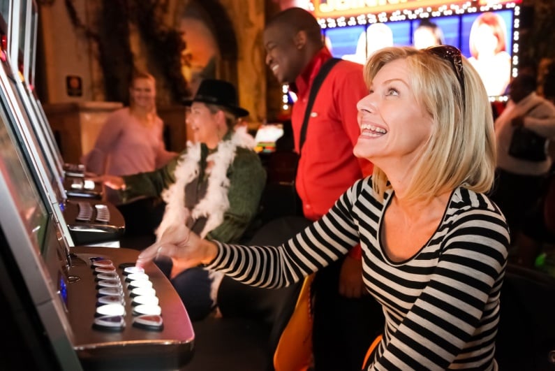 Excited woman playing slots