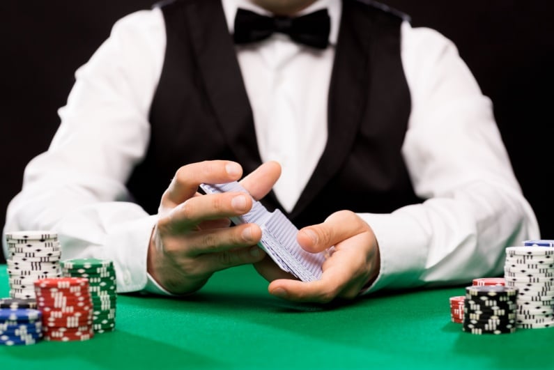 Dealer shuffling cards