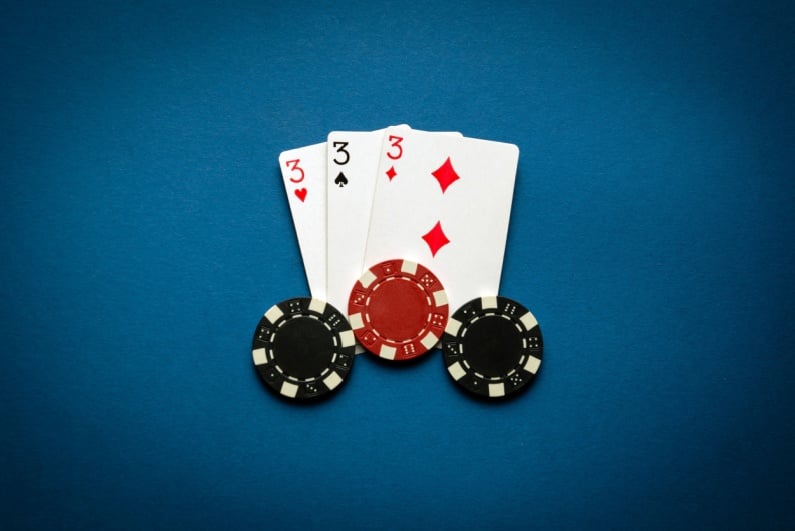 Three threes and poker chips