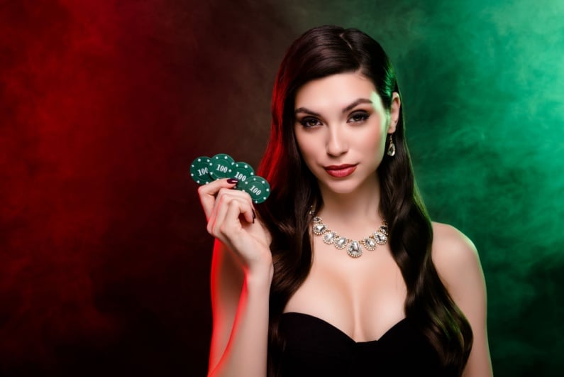 Woman holding casino chips