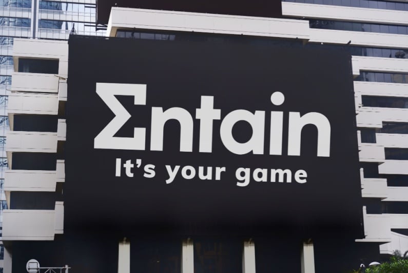 Entain billboard on building