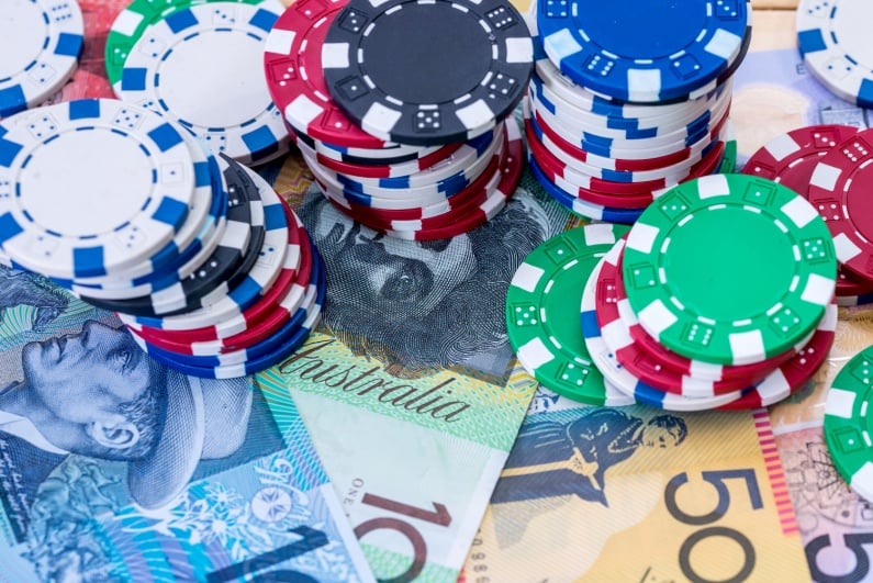 Casino chips on Australian currency