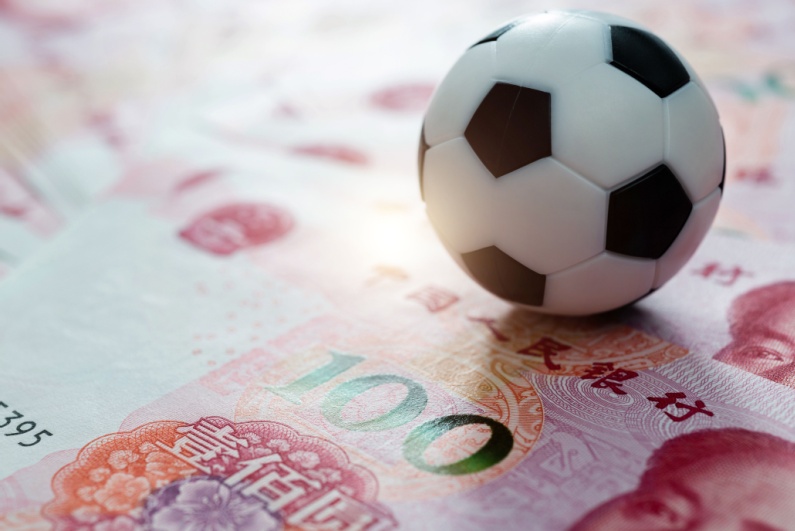 Soccer ball on Chinese money