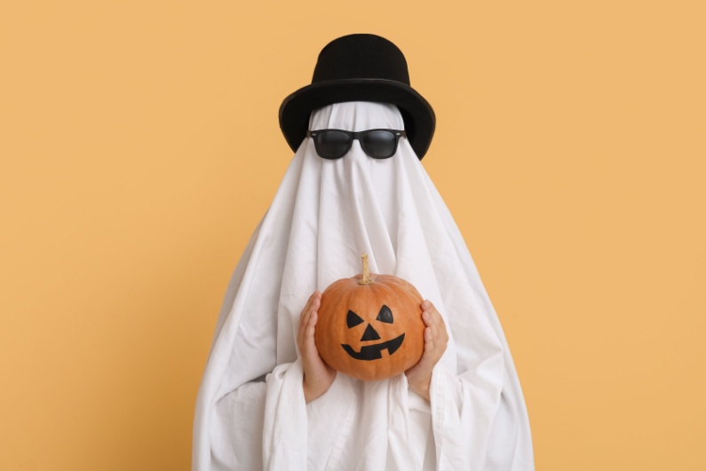 Ghost holding pumpkin