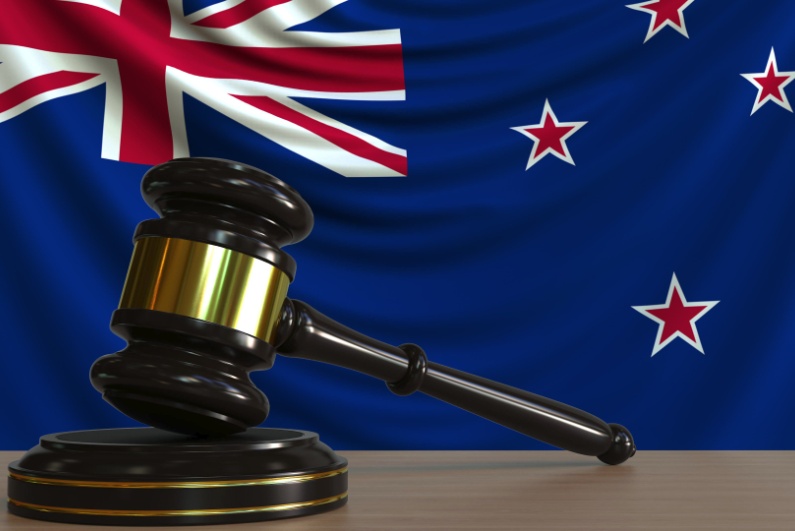 Judge's gavel in front of Australian flag