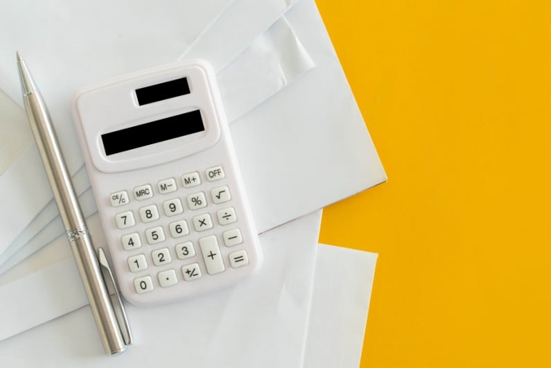 Calculator on yellow background