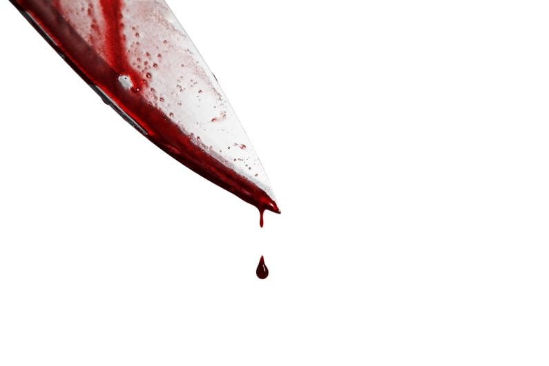Knife dripping with blood