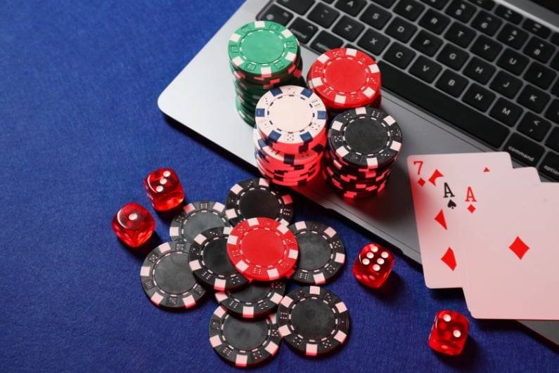 Casino chips and laptop