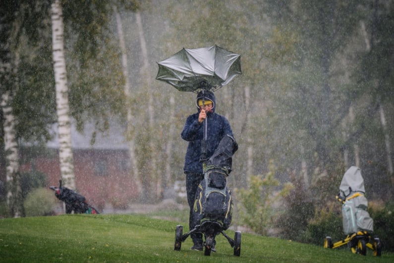 Golfer in the rain