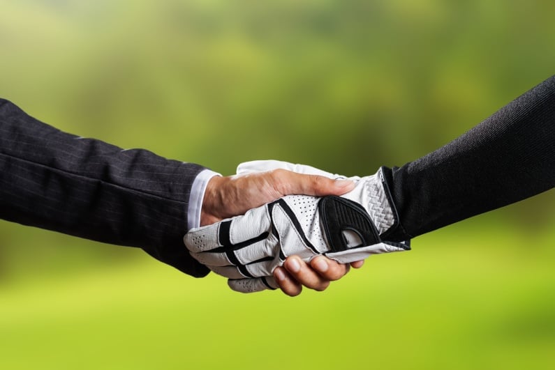 Golfers shaking hands