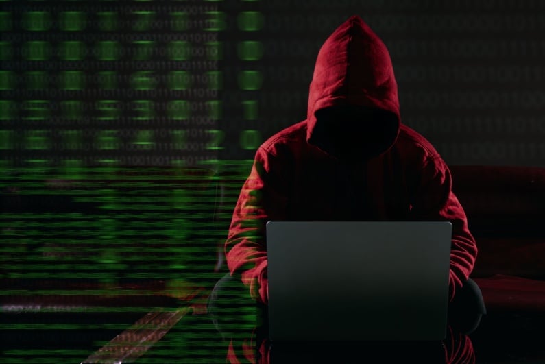 Hacker in red hoodie