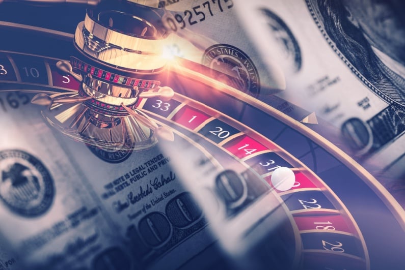Roulette wheel and cash