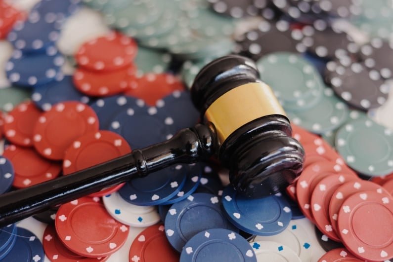 Poker chips and wooden gavel