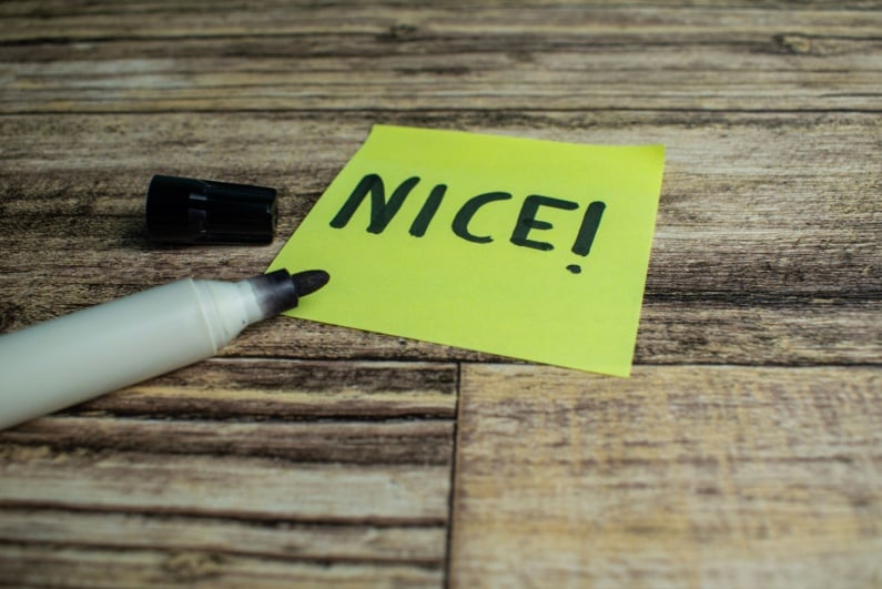 The word NICE written on a post-it