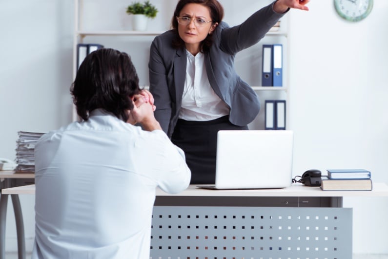 Man begging as he is fired by female boss