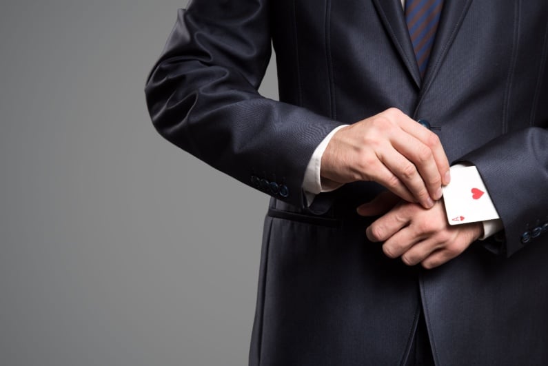 Man with Ace up sleeve