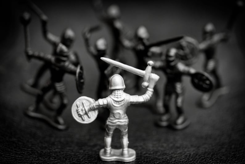 Toy soldier concept of unfair battle