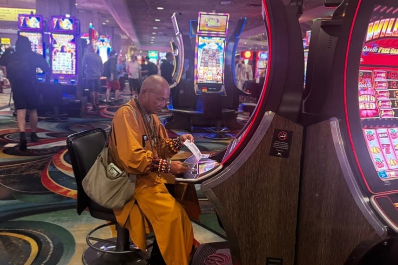 Monk playing slots