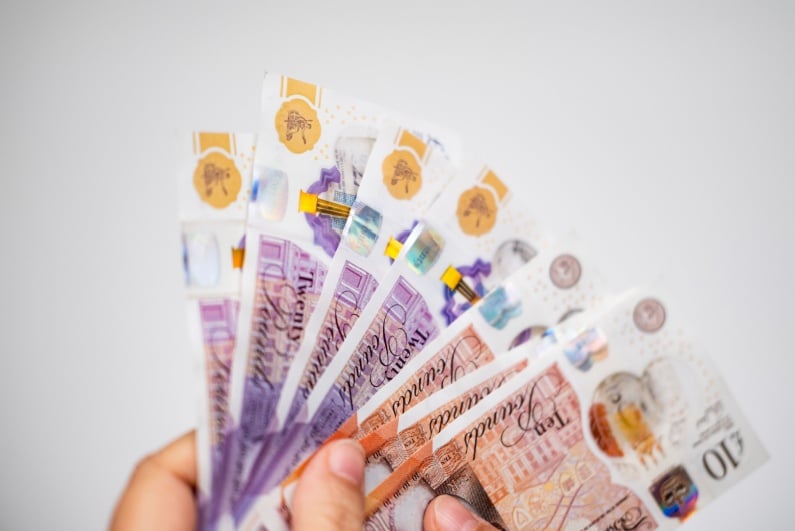 Person holding cash