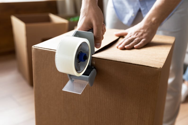 Taping up moving box
